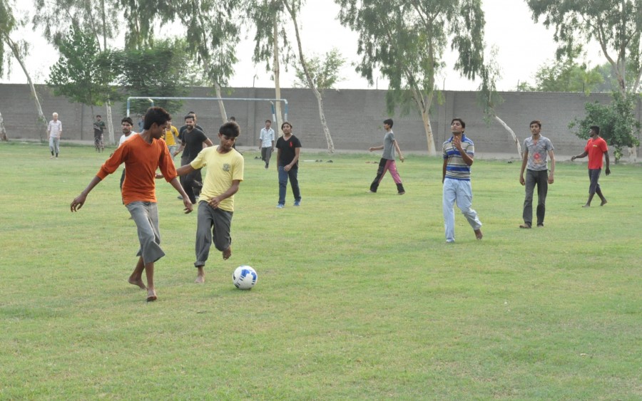 Boys Enjoying a Soccer Game in Machike Boarding School