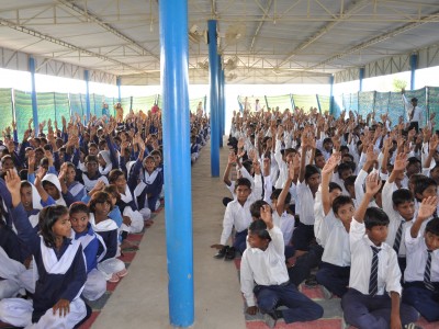 Boys and Girls in Machike Boarding School Show Appreciation to ABC by Raising Hands