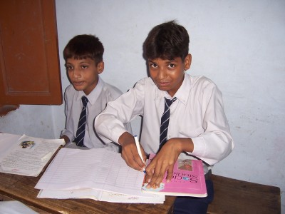 Boys in Martinpur Day School Busy Doing Their Class-work