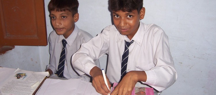 Boys in Martinpur Day School Busy Doing Their Class-work