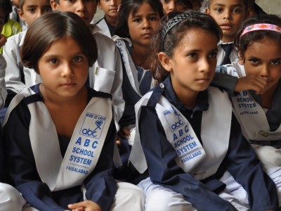 Girls in Faisalabad Day School Eagerly Listen to Their Teacher