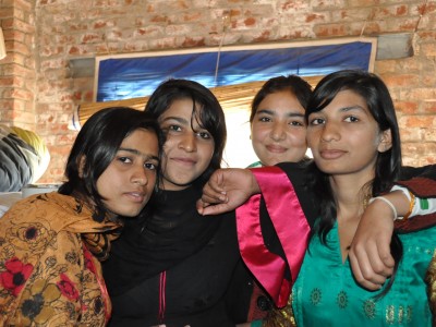Girls in Their Dorm in Machike Boarding School Posing as a Group of Friends
