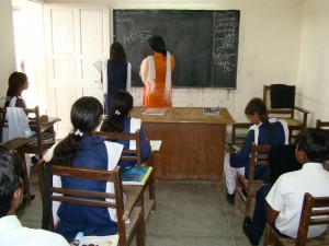 A Teacher Giving Individual Attention to a Student