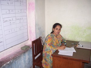 A Teacher Working on Her Lesson Plan